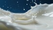 © SAFIICLON - An elegant close-up shot of a white milk crown splash, with fresh droplets frozen in motion against a rich blue background