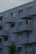 © Viktar - Contemporary apartment complex featuring unique balcony designs and large windows, showcasing modern urban living.