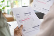 © weedezign - Couple facing overdue bills and financial pressure at home, stressed by inflation and economy recession