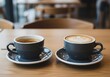 © miseni - Two Cups of Coffee on a Wooden Table.