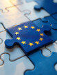 © Maria - european union flag puzzle piece lit soft morning light golden stars shining brightly blurred background