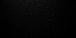 © chanisorn - Black background, glistening water droplets, textured surface,  still life,  reflection