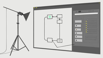 Studio lighting setup with computer screen showing workflow diagram.