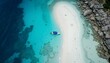 © Zeeshan - Aerial View of a Secluded Tropical Island with a White Sand Beach, Turquoise Water, and a Boat Anchored Nearby