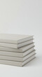 © abdulhamid - Stack of Gray Books Mockup with Copy Space