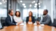 © 69 - Business Meeting with Professionals Engaged in Discussion in a Modern Office Environment with Blurred Background and Focus on Participants
