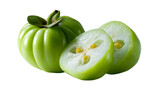 Vibrant green garcinia fruit sliced revealing interior with yellow seeds and fibrous texture, cut out transparent
