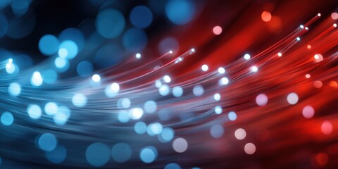 Abstract design of light streaks and glowing points.  Red and blue tones