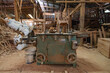 © Washburn - Old industrial radial arm saw in woodshop