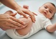 © PixelProCreative - Gentle hands apply lotion to a baby s leg