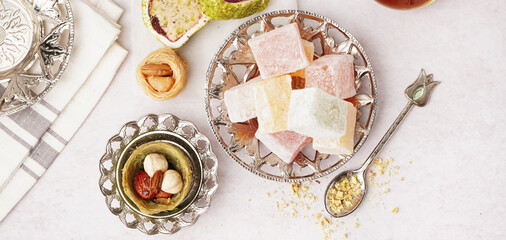 Wall Mural - Plate with tasty Turkish Delight on light background