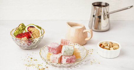 Wall Mural - Bowls with tasty Turkish delight on light background