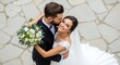 © Budi - Loving Moment of a Newlywed Couple Kissing