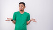 © DigitalProvoke - Asian man showing thinking gesture with his eyes looking up over white background