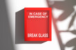 © Cagkan - Emergency box hanging on white wall with break glass sign