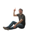 © 1STunningART - Positive young man sitting on the floor pointing forefinger up. Contented guy relaxed mood isolated on transparent background