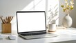© andre - Bright and minimalist home office setup featuring a laptop with a blank white screen, perfect for copy space or mock-up designs, bathed in soft natural light from a window