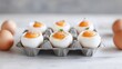 © DIAHIMAGESNEW - Poached eggs in egg carton, ready to eat