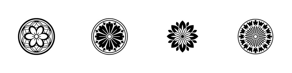 Set of four traditional Japanese Kamon family crests with floral motifs, black and white circular emblems isolated on a white background