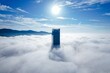 © AmazingAerialAgency - Aerial view of a skyscraper piercing through a sea of fluffy white clouds under a bright sun, Palazzo della Regione Piemonte, Piemonte, Italy.