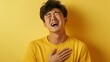 © maxximmm - Man with his hands on his chest. A man struggling to breathe in a realistic video. A field of yellow and white with a deep depth of pain. Man standing with his hands on his lifestyle chest.