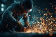© ffunn - Focused man in safety gear using an angle grinder on metal, creating bright sparks in an industrial workshop environment.