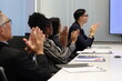 © unikyluckk - Diverse Team Working Together in Modern Co-Working Space. Casual meeting of senior diverse business team analyzing financial data. Multiethnic business people working in the office. senior man.