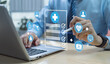 © Father_Studio - Doctor using virtual screen for medical document verification, connected to healthcare network with digital technology concept, showcasing modern medical innovation and efficient healthcare solutions