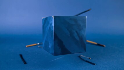 Abstract blue cube installation with minimalist composition and depth of field
