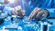 © Anu - Close-up of technician working on circuit board