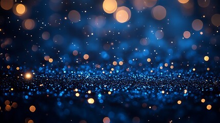 Sparkling blue and gold bokeh lights abstract background