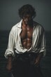© ALL YOU NEED studio - Pirate bad boy man in open shirt on stormy ocean backgroundA tall muscular pirate with rugged charm and tousled hair stands in an open white shirt and dark trousers, a sword at his side.