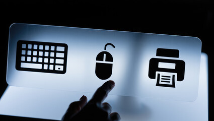 Interactive Technology A Close Up of a Finger Touching a Digital Interface Displaying a Keyboard Mouse and Printer Icon on a Sleek Illuminated Surface