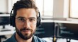 © Mister - Smiling Software Developer with Headphones and Glasses