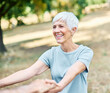 © Lumos sp - Happy active senior couple, portrait of an elderly woman with her husband dancing or swinging and holding hands and exercising  in park outdoors
