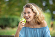 © auremar - a beautiful woman with an apple