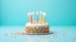 © TShirt Empire - Birthday Cake with Candles & Sprinkles: Festive Celebration Image, Colorful Dessert, Sweet Treat, Party Food, Light Blue Background