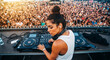 © Milan - Female DJ performing on stage for a massive crowd at a music festival. Live electronic music concert and entertainment.