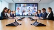 © Let it be - Business professionals attending a hybrid meeting with blurred in-person participants and a clear video conference screen