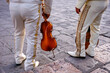 San Miguel de Allende, Mexico - February 8, 2025: Detail of a mariachi musicians with a violin in San Miguel de Allende, Guanajuato, Mexico.