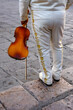 San Miguel de Allende, Mexico - February 8, 2025: Detail of a mariachi musician with a violin in San Miguel de Allende, Guanajuato, Mexico.