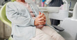 © peopleimages.com - Woman, patient and hands stress for dental surgery, tooth extraction or pain relief at clinic. Checkup, female person and waiting in anticipation with anxiety, fear or nervous for dentist on chair