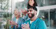 © Abrahams66/peopleimages.com - Applause, healthcare and laughing with hospital administration team in boardroom for celebration. Funny, meeting or success with manager and medical staff clapping in clinic for achievement or goals