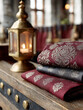 © SashaMagic - Ornate fabrics and lantern on a rustic wooden table for cozy decor.