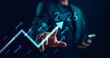 © Looker_Studio - Businessman pointing at upward arrow and 2026 target goal icon, symbolizing future growth, business strategy, financial success, and goal achievement planning. Business new year.