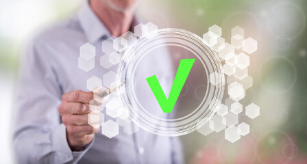 Wall Mural - man touching a validation process concept