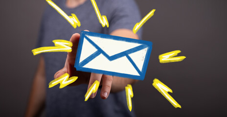 Person holding digital email icon, fast communication concept.