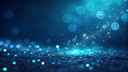 Abstract glowing blue bokeh lights and sparkling particles on a dark background