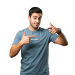 © WOMAN PNG - Young man confidently points fingers in action pose with a subtle smile transparent background