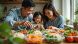 © Viktor - Happy Asian family selects healthy pre-made meals with rice, vegetables. Busy parents, daughter enjoy nutritious food options from meal prep service at home. Bonding moment promotes wholesome eating